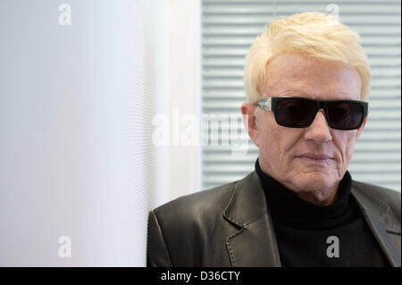 German popular music (Schlager) singer Heino poses during an interview in Berlin, Germany, 11 February 2013. The 74 year-old is one of the most successful German language musicians selling 50 million records. The cover versions album has been downloaded legally more often in the first few day afters its release than the work of any other German language artists. Photo: MAURIZIO GAMBARINI Stock Photo