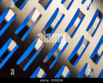 Close-up details of a sharp kitchen microplane used for finely grating cheese and zesting lemons. Stock Photo