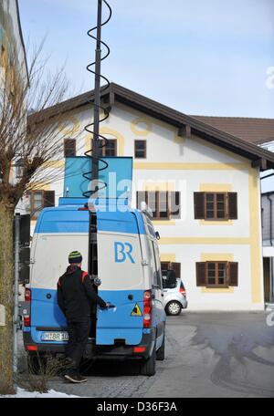 A Bavarian Broadcasting vehichle sits outside of the birth house of Pope Benedict XVI in Marktl Am Inn, Germany, 11 February 2013. Photo: ANDREAS GEBERT Stock Photo