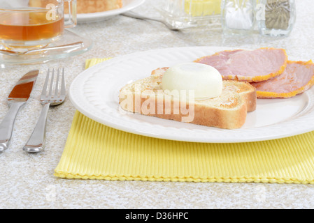 Poached egg on toast Stock Photo