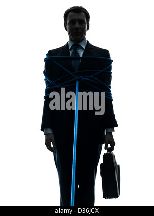 one  business man tied up prisoner in silhouette studio isolated on white background Stock Photo