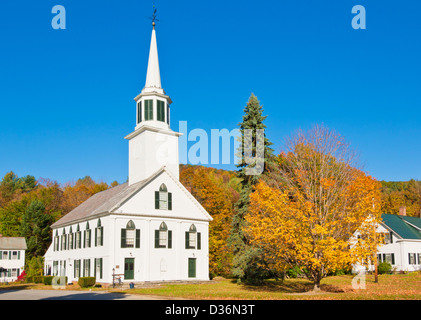 Autumn colours around the traditional white timber clad church Townshend Vermont United States of America USA