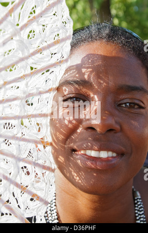 Hamburg, Germany, Portrait of a Young Woman with Fan Stock Photo