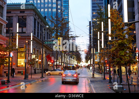 junction of west pender street and granville downtown city at night Vancouver BC Canada Stock Photo