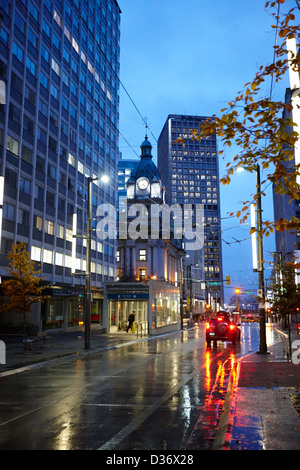granville street looking towards Vancouver harbour at night BC Canada Stock Photo
