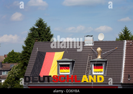 Essen, Germany, World Cup decorations on the roof of a private house Stock Photo