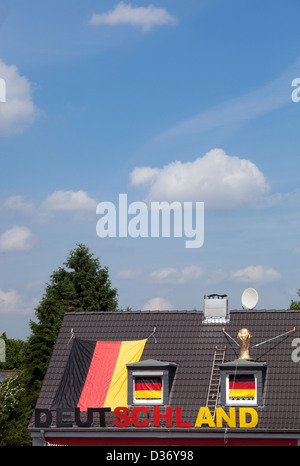 Essen, Germany, World Cup decorations on the roof of a private house Stock Photo