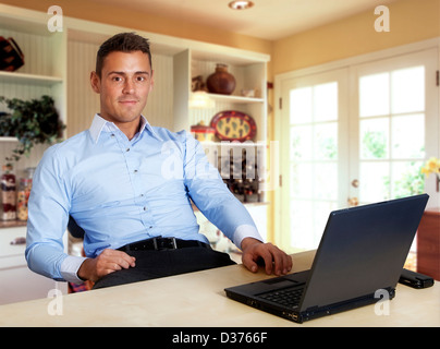 Man working at laptop computer Stock Photo