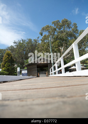 The jetty or wharf on Dangar island were you are delivered by ferry. Near the Hawkesbury River Bridge. Stock Photo