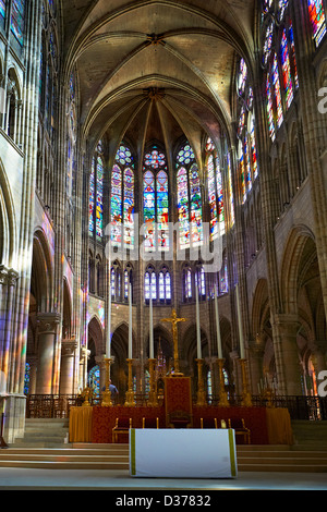 Medieval Gothic stained glass window in the choir  of Saint Denis. Cathedral Basilica of Saint Denis Paris Stock Photo