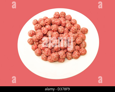 small meatballs for the soup on a white plate Stock Photo