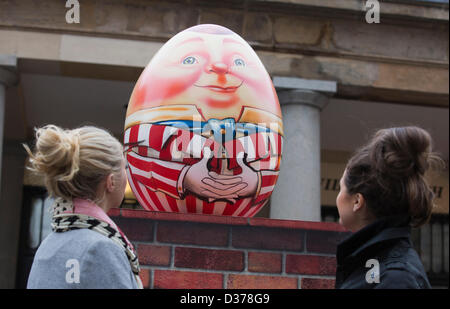 London, UK. 12th February 2013.  Veronica Fulton, 21, and Imogen Money, 22, from London admire the eggs. Over 100 giant Easter eggs designed by artists and designers were unveiled today in Covent Garden Piazza, London, to launch The Lindt Big Egg Hunt in support for the charity 'Action for Children'. For six weeks, from 12 February to 1 April 2013, giant Easter eggs will tour the country, from London's Covent Garden to Birmingham, Liverpool, Manchester, Glasgow and back to London in time for Easter. Photo: Nick Savage/Alamy Live News Stock Photo