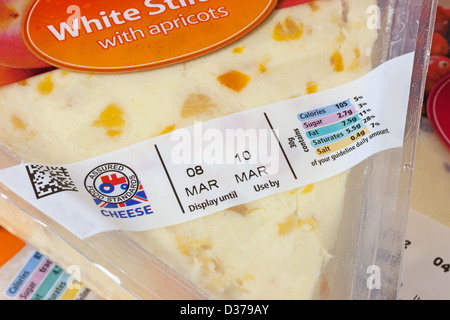 Close up of a sell by/use-by/display-by label on a packet of cheese.Also showing nutrition information. Stock Photo