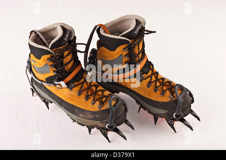 Climbing boots with spikes for traction Stock Photo