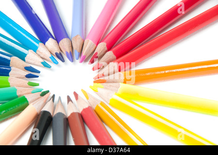 Shot of multicolored pencils in round shape isolated on white Stock Photo