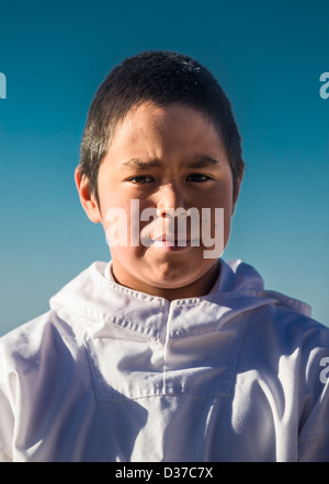 Inuit boy, Ittoqqortoormiit, Greenland Stock Photo