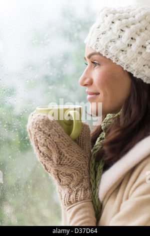 USA, New Jersey, Jersey City, profile of young woman with snowman Stock ...