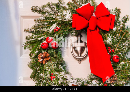 USA, New Jersey, Jersey City, Christmas wreath hanging on door Stock Photo