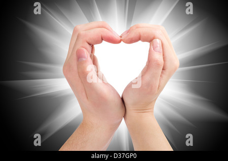 Two hands form a heart shape Stock Photo - Alamy