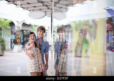 Couple window shopping together Stock Photo