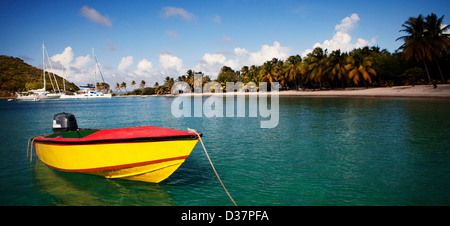 Colorful boat in tropical water Stock Photo