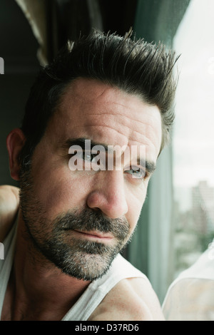 Close up of man's serious face Stock Photo