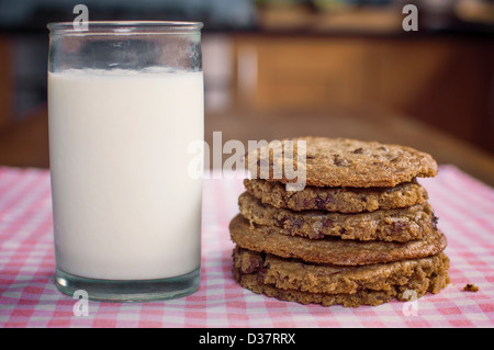Stack of chocolate chip cookies and milk Stock Photo