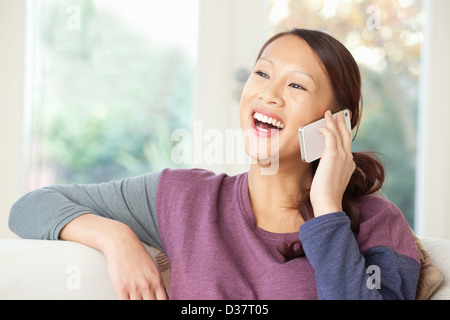 Woman talking on cell phone Stock Photo