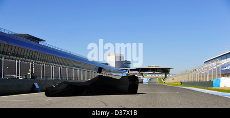 covered Mercedes Formula One race car on the track of Circuito de Velocidad Racetrack in Jerez de la Frontera, Spain Stock Photo