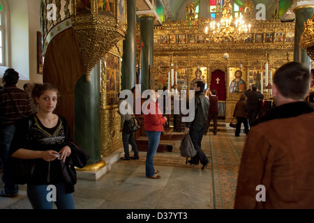 Group of visitors in the Church of the Holy Trinity, Heybeliada, Turkey Stock Photo