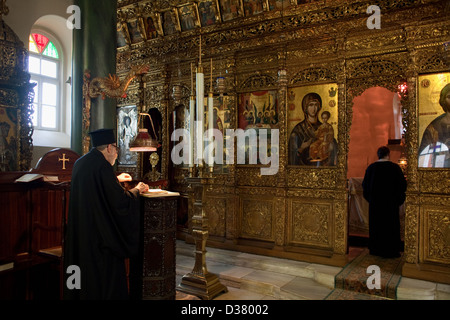 Deacon Dorotheos during the evening service in the Church of the Holy Trinity, Heybeliada, Turkey Stock Photo