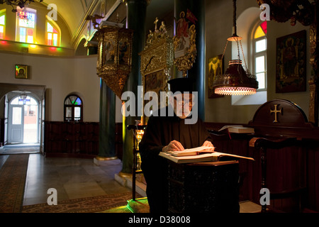 Deacon Dorotheos during the evening service in the Church of the Holy Trinity, Heybeliada, Turkey Stock Photo