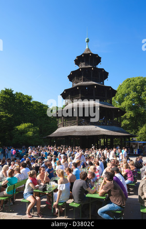 People drinking in The Chinese Tower beer garden, Englischer Garten, Munich, Bavaria, Germany