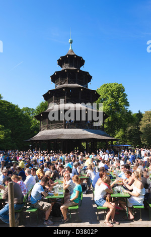 People drinking in The Chinese Tower beer garden, Englischer Garten, Munich, Bavaria, Germany