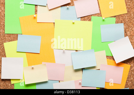 Corkboard with Note papers Stock Photo