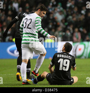 Glasgow, Scotland, UK. 12th February 2013.   Tony Watt makes his point to Leonardo Bonucci during the Champions League game between Celtic and Juventus from Celtic Park. Credit: Action Plus Sports Images / Alamy Live News Stock Photo