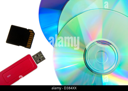Cd and dvd disc, a memory card and flash drive on white background Stock Photo