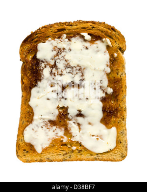 Slice of toast (brown, wholemeal bread), buttered. Stock Photo