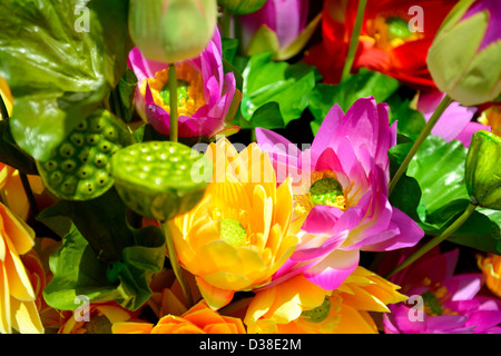 chinese new year ornaments, lotus flowers, lotus buds, plastic flowers. Stock Photo