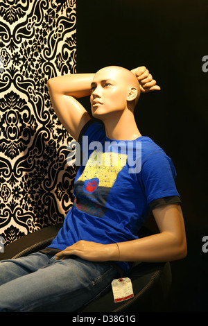 Dummy in a show-window of shop Stock Photo