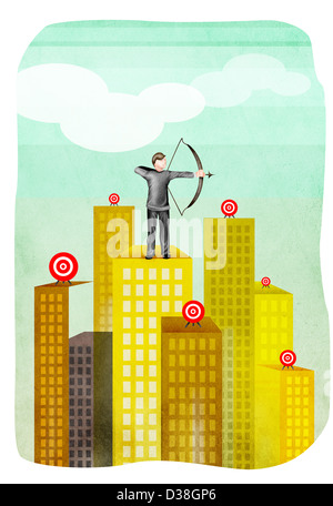 Businessman aiming with a bow and arrow Stock Photo