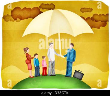 Family sheltering under an insurance cover umbrella Stock Photo