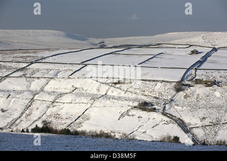 Snow covered hills in Winter in Crimsworth Dean  near Hebden Bridge in the South Pennines in West Yorkshire Stock Photo