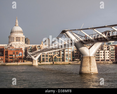 St Paul's Cathedral, London, England - view across the Thames from the Millennium Bridge, also known as the Wibbly Wobbly Bridge Stock Photo