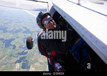 Man about to skydive from plane Stock Photo