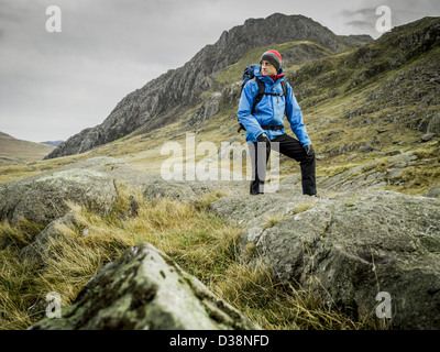Man hiking in rocky landscape Stock Photo