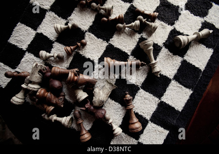 Game pieces on furry chess board Stock Photo