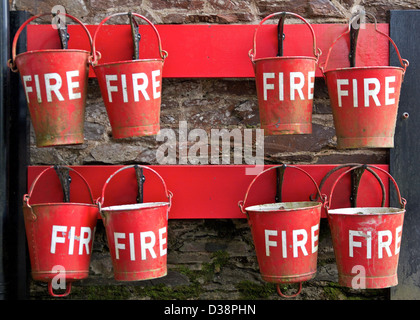 Red fire buckets Stock Photo