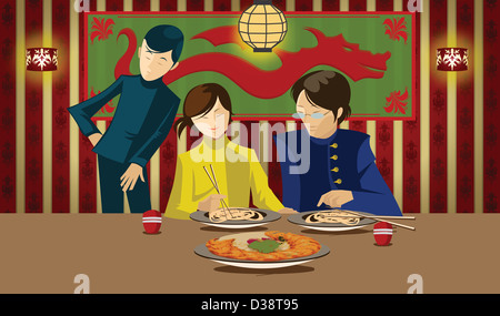 Waiter serving a couple in a Chinese restaurant Stock Photo