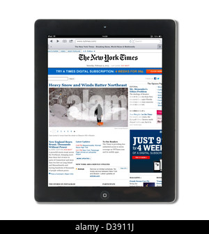 Reading the online edition of the New York Times viewed on a 4th generation Apple iPad, USA
